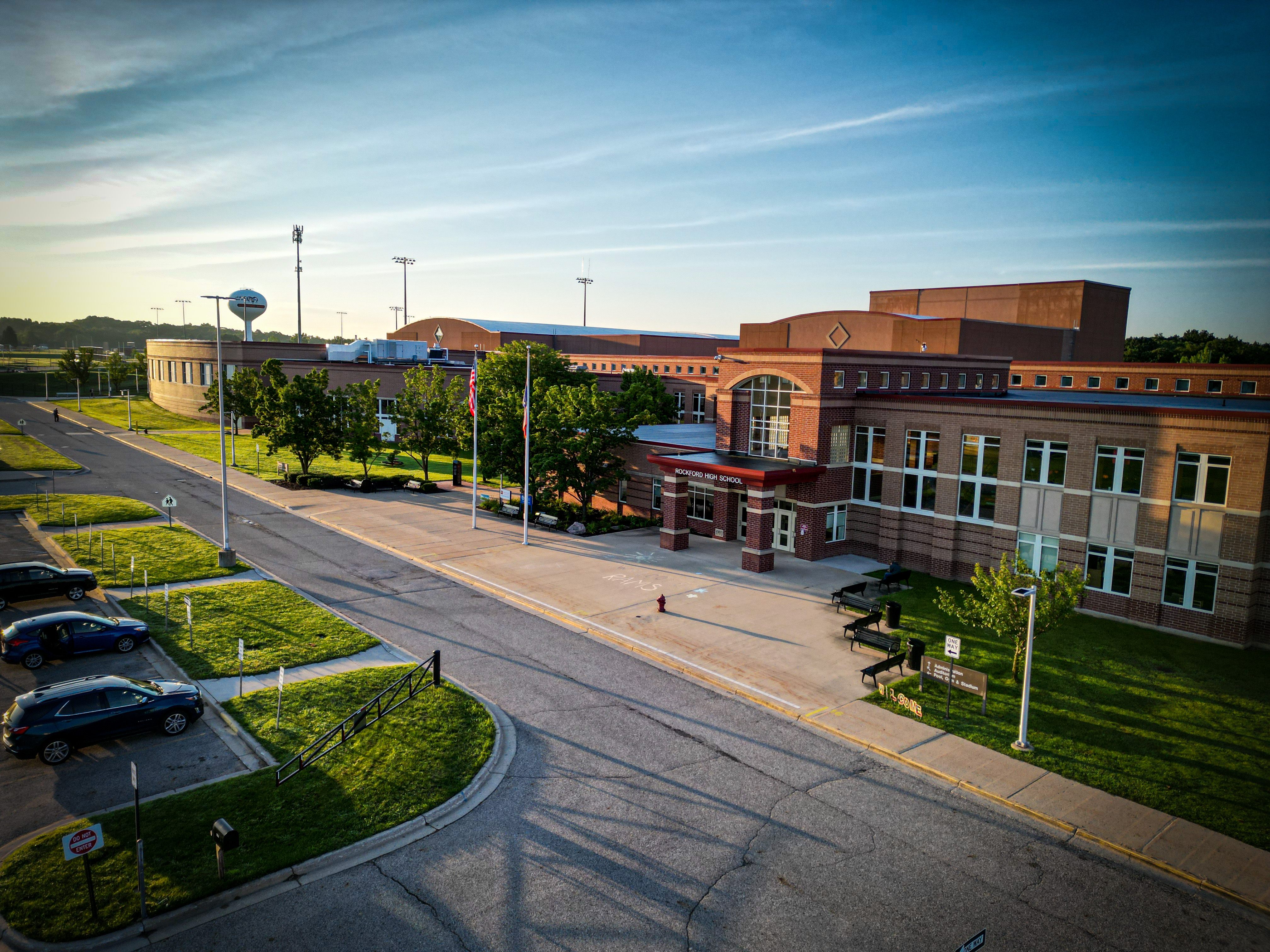 Aerial view of a Rockford Public Schools campus at sunrise
